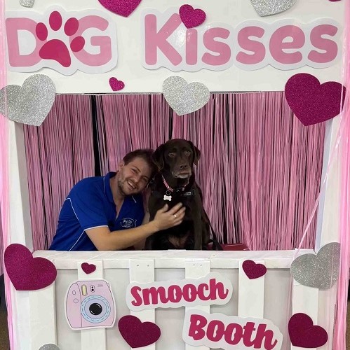 Pet City Valentine’s Day Dog Kissing Booth